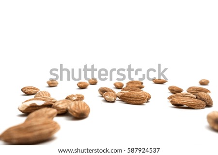 Almonds isolated on white background. selective focus. with copy space.