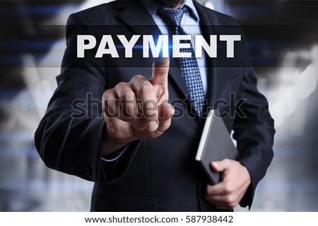Businessman is pressing button on touch screen interface and selecting payment.