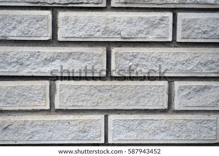 White brick wall; abstract background.