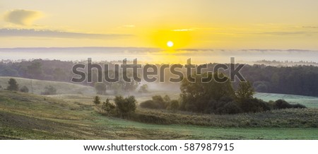 misty sunrise over the village