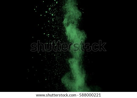 abstract color powder explosion on  black background.abstract color powder splatted on black background. Freeze motion of color powder exploding.