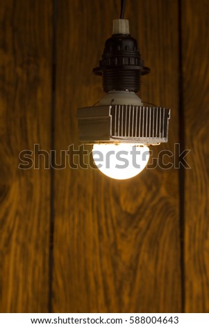 Diy led lamp on wooden background