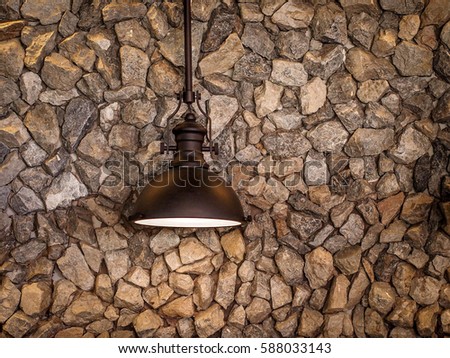Rustic style Lamp, Lantern on red-brown stone wall background copy space, Loft Style, Fisherman Village, Thai modern Style