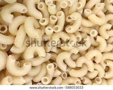 Raw macaroni at the supermarket Royalty-Free Stock Photo #588053033