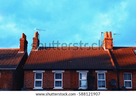 Blurred picture of British terrace house in Doris storm day, England UK.