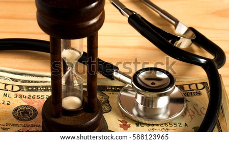 medical cost rising, stethoscope on dollar banknote money. concept of health care costs finance. health insurance .  (selective focus )