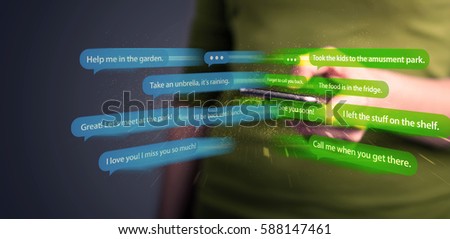Young woman writing messages with smartphone application 