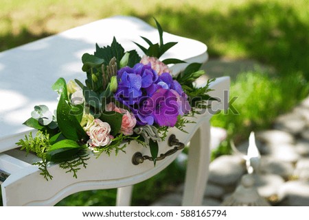 vintage table with flowers outside