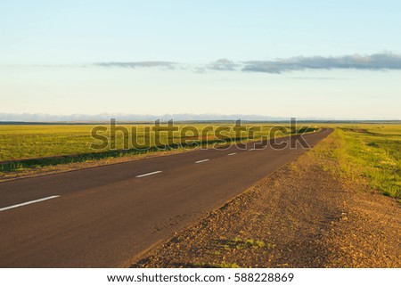 Asphalt road with sunset nature landscape background