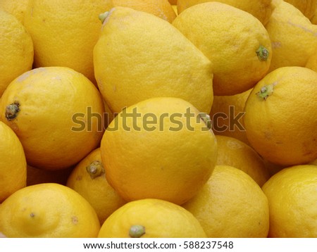 lemons on the market for sale as a background. Selective focus