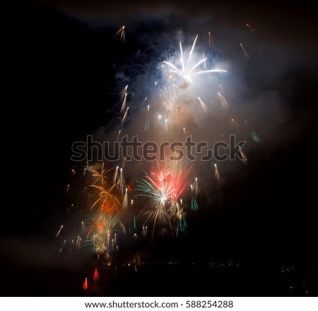 Photo of wonderful fireworks on dark sky