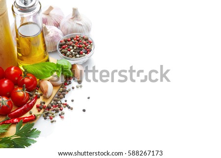 Healthy Food & drink diet Italian lifestyle: Mediterranean vegetable herbs spice healthy cuisine. Olive oil tomatoes garlic parsley basil. Top view Isolated on white Free space text layout Royalty-Free Stock Photo #588267173