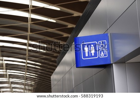 restroom sign inside the office building