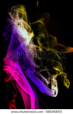 colorful smoke on dark background   