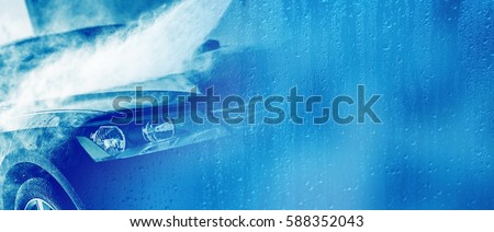 Car Wash Business Banner. Washing Car Backdrop with Copy Space. Blue Colors. Royalty-Free Stock Photo #588352043