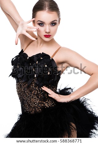 Beautiful ballroom dancer girl in elegant pose black dress on white background