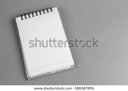 white paper note on gray background