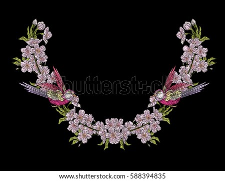 Embroidery. Embroidered design elements with sakura flowers and leaves and bird in vintage style on a black background. Stock vector illustration.