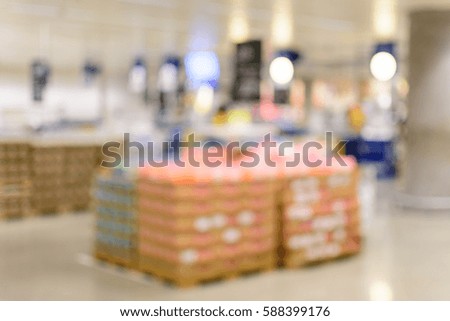 Blurred background : in the big shopping mall. Shopping concept