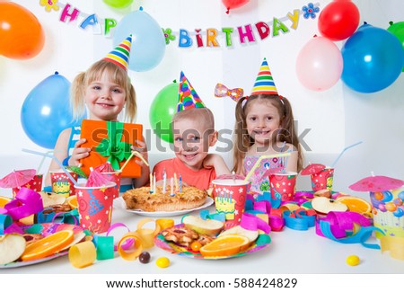 Portrait of group of children at birthday party