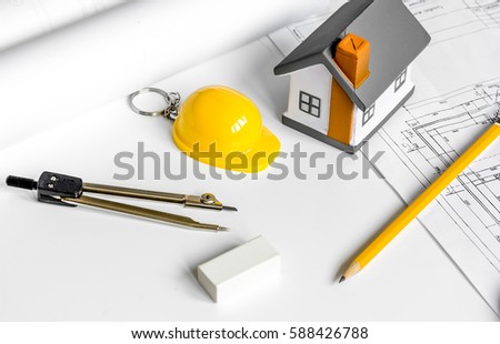 architect tools on white background with drawings apartments top