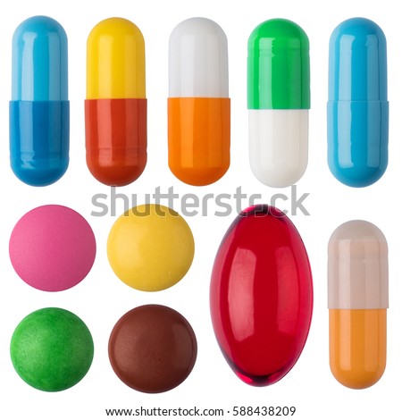 Many colorful pills and tablets isolated on white. Royalty-Free Stock Photo #588438209