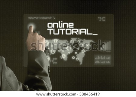 Business man pointing to virtual screen. Education & Technology Concept