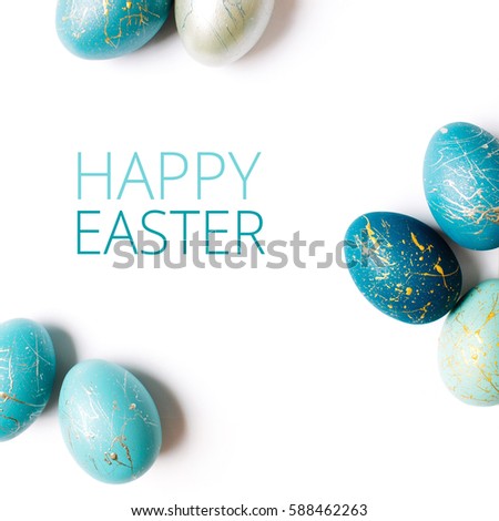 Happy Easter card. Frame  with gold and blue speckled easter eggs with copy space for text. isolated on white background Royalty-Free Stock Photo #588462263