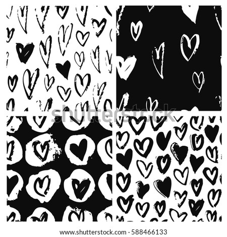 Set of seamless pattern with black and white hearts. Hand drawn vector illustration. Decorative elements for design. Creative art work