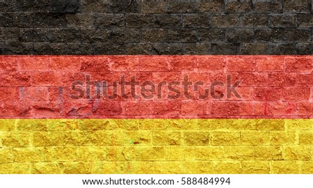German flag painted on old brick wall