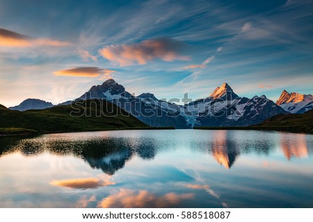 Great view of the snow rocky massif. Popular tourist attraction. Dramatic and picturesque scene. Location place Bachalpsee in Swiss alps, Grindelwald valley, Bernese Oberland, Europe. Beauty world.