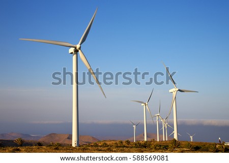  isle of lanzarote   spain africa wind turbines and the sky 
 Royalty-Free Stock Photo #588569081