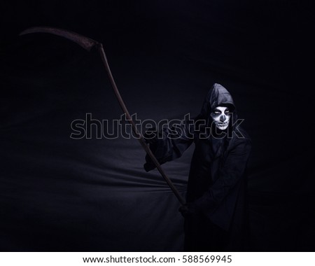 Reaper in studio on black background
