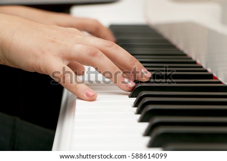 Close up piano, white and black keyboard