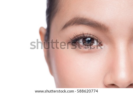 Eyes. Closeup of beautiful asian woman with brown eyes make up eye shadow Royalty-Free Stock Photo #588620774