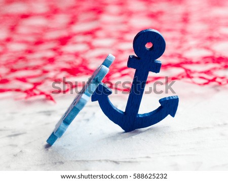 Background with decorative anchors and wheels on a white painted background. Place for text. Top view with copy space.