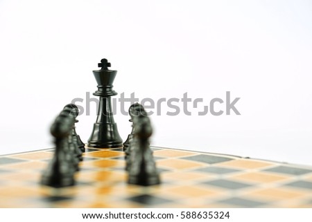 Chess photographed on a chessboard. Isolated on white background