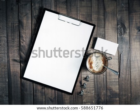 Photo of blank stationery. Blank corporate identity template on vintage wooden table background. Blank branding mock up. Mockup for design portfolios. Top view.