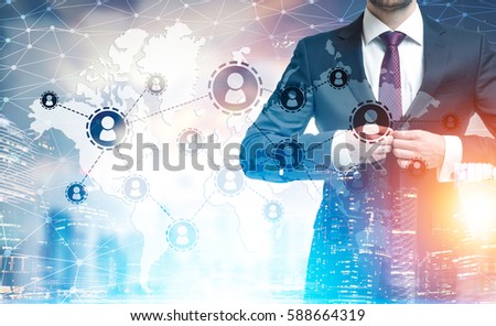 Close up of a businessman in a red tie buttoning his vest while standing against a cityscape with a world map and a network. Elements of this image furnished by NASA. Toned image. Double exposure.