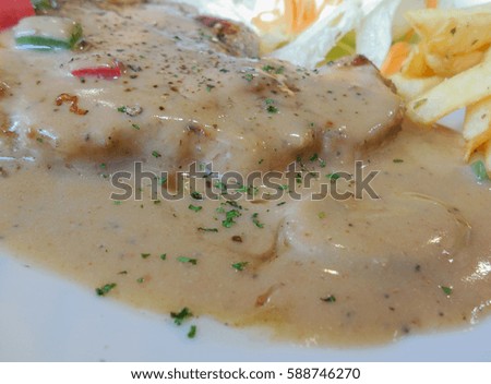 Soft focused picture of  Grill steaks with sauce