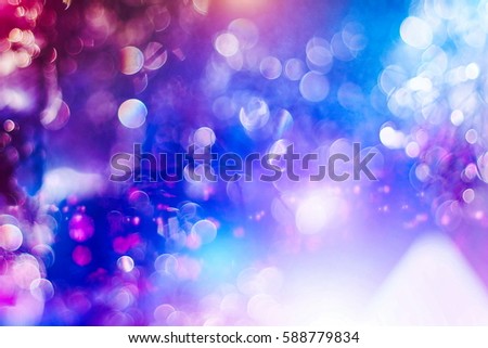 colorful crowd on concert,disco night Royalty-Free Stock Photo #588779834