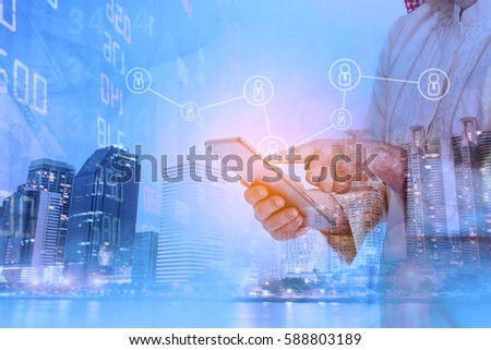 Double exposure Business man with modern visual technology for Trading to sell in  Stock Market with index graph and indicator Background .