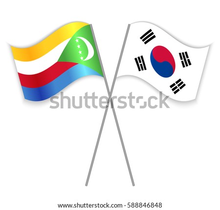 Comoran and South Korean crossed flags. Comoros combined with South Korea isolated on white. Language learning, international business or travel concept.