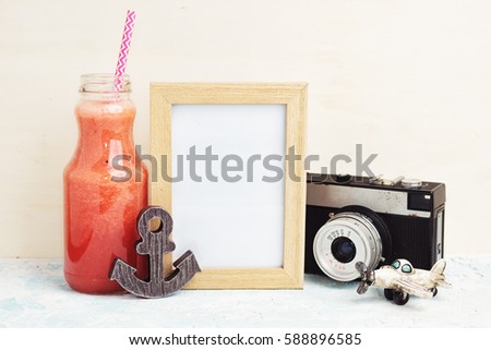 Mock up with Red drink, photo frame and anchor. Healthy lifestyle, travel, tropics concept. Text space.