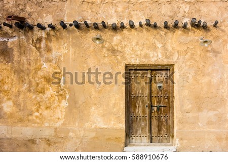 Traditional Arabic House Door Royalty-Free Stock Photo #588910676