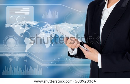 Businesswoman hold tablet with world map and graph on background business concept, Elements of this image furnished by NASA