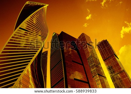 sunset in the city on the background of skyscrapers