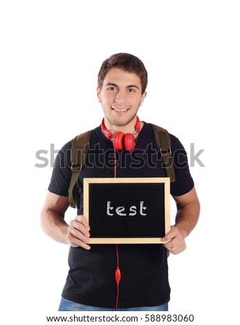 Close up of a young handsome man holding chalkboard with text "test". Education concept. Isolated white background.