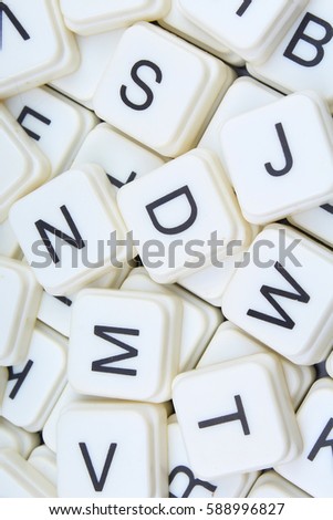 Letters as background.3D block letters texture.Letter collection pattern. Alphabets crosswords background.