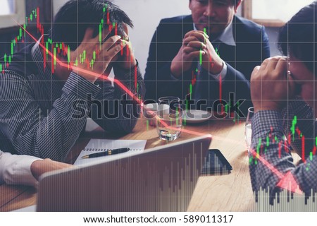Team businessman with chart in the fall. economy or stock market going down. Royalty-Free Stock Photo #589011317